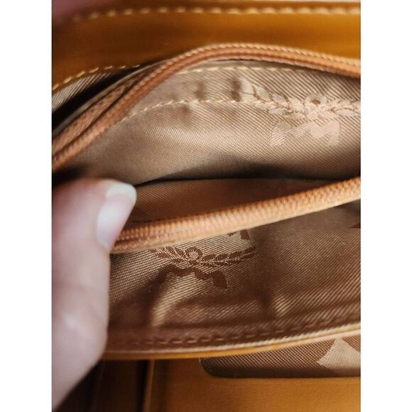 Mcm conganc leather compact wallet  Eight card slots and lots of compartments  E - Picture 9 of 13